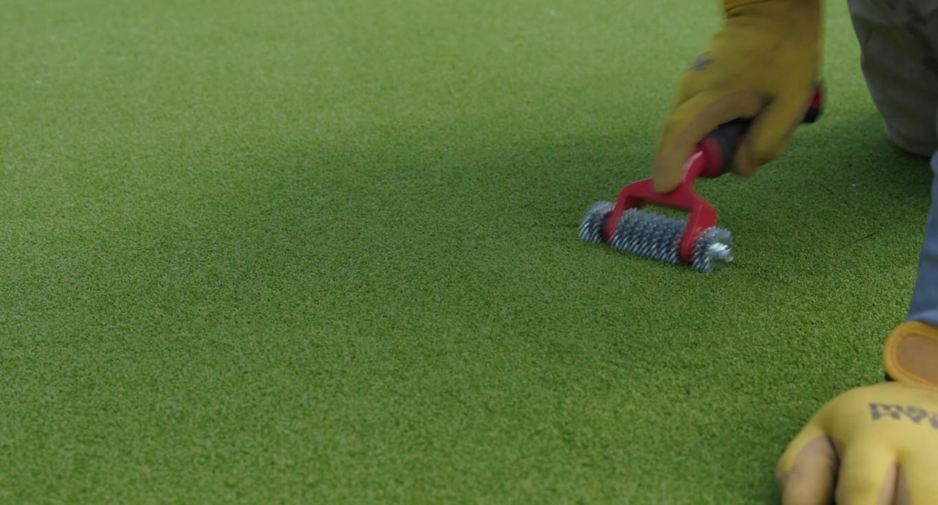 Custom backyard putting green installation